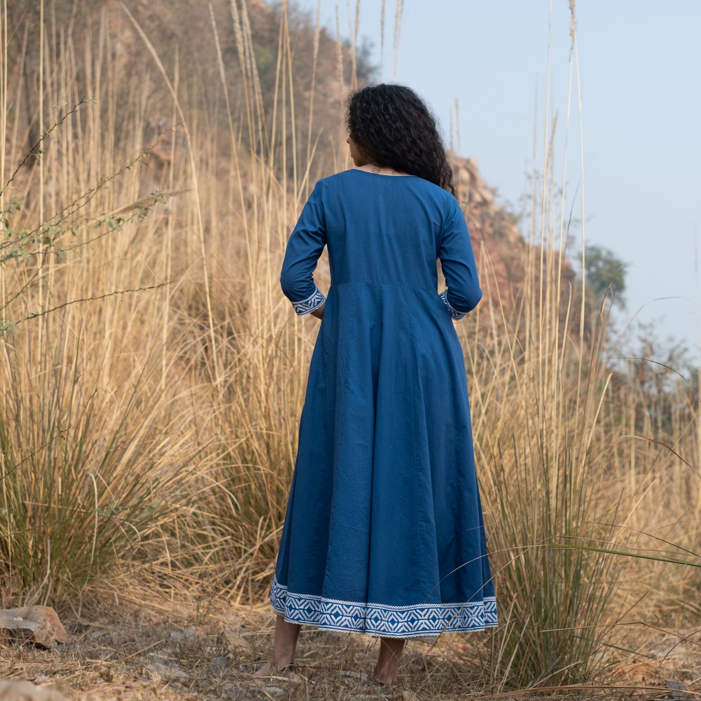 Solid indigo Anarkali Kurta with block print border and lace details and white pant (set of 2)
