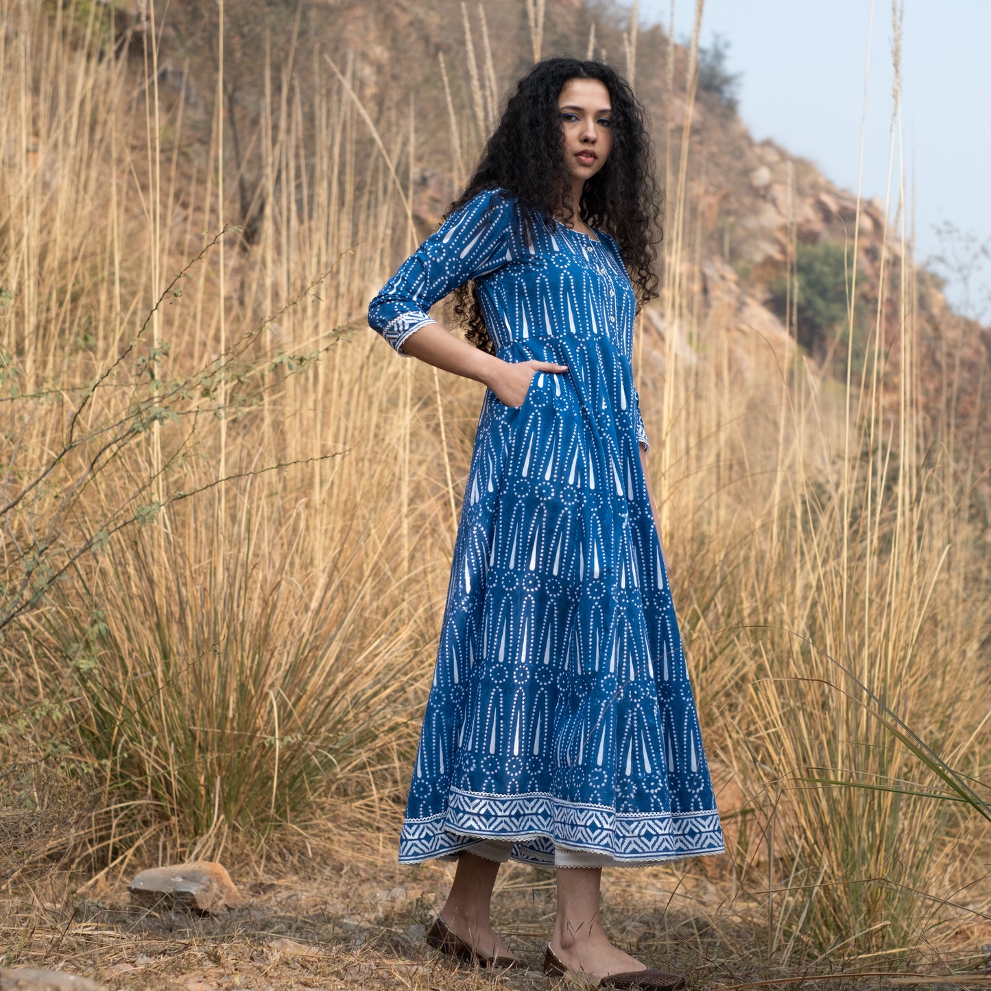 Indigo block printed Anarkali kurta with border and lace details and white pant (set of 2)