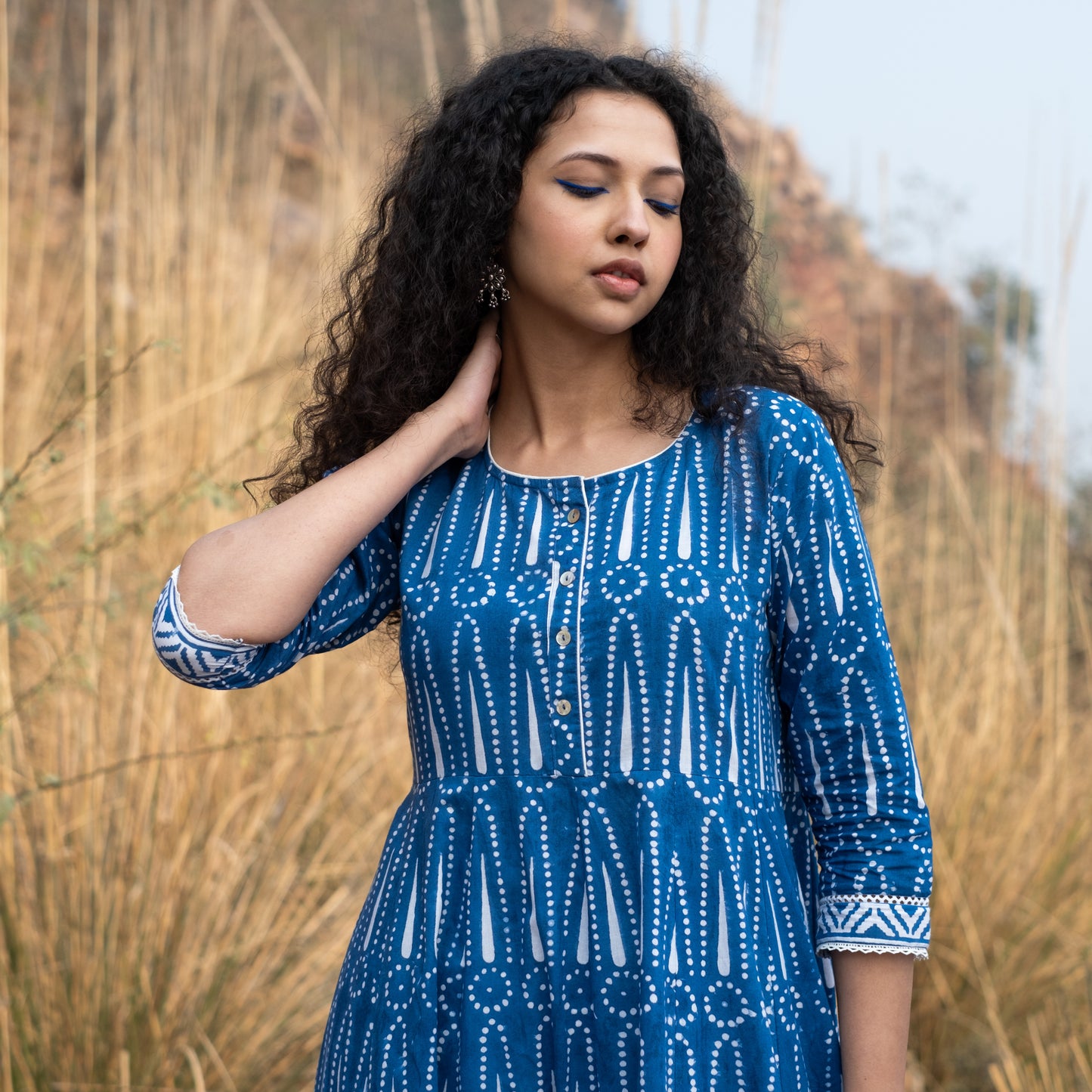 Indigo block printed Anarkali kurta with border and lace details and white pant (set of 2)