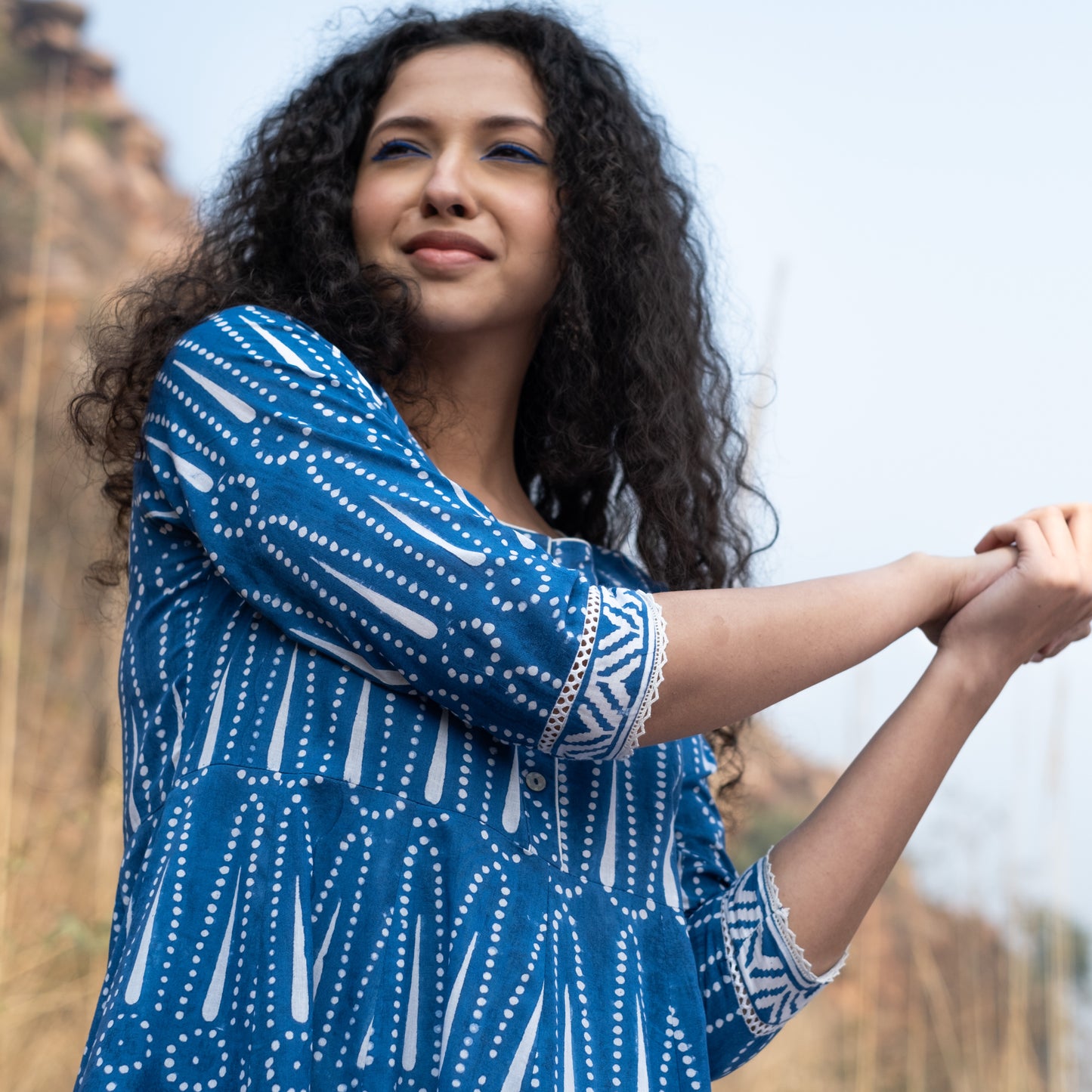 Indigo block printed Anarkali kurta with border and lace details and white pant (set of 2)
