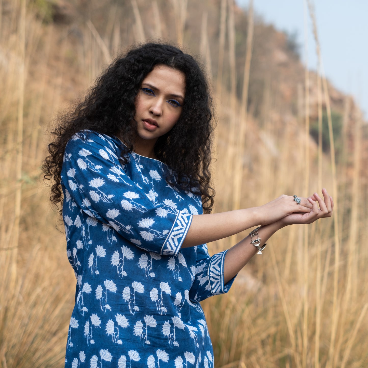 Indigo block printed knee length shift dress with three quarter sleeve and side pocket