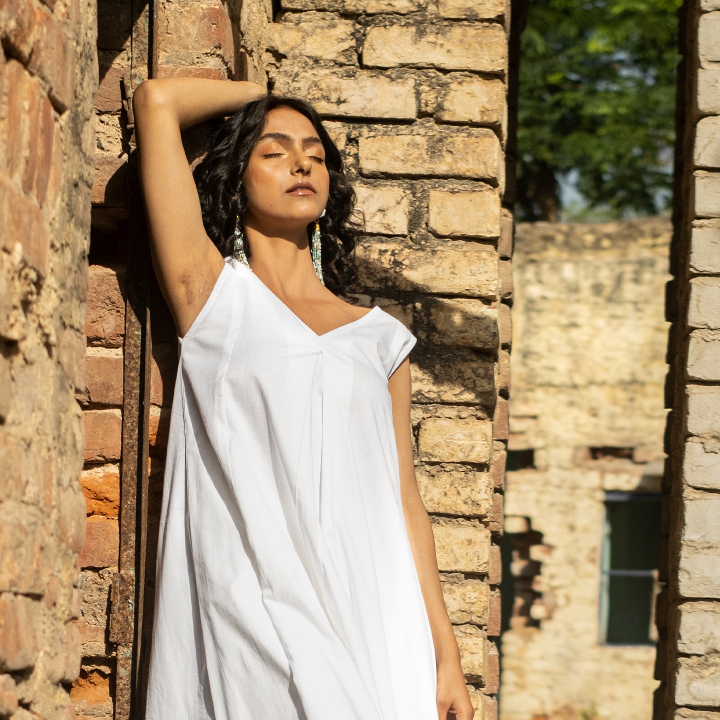 White A-line flared front pleat detail kurta paired with palazzo pants