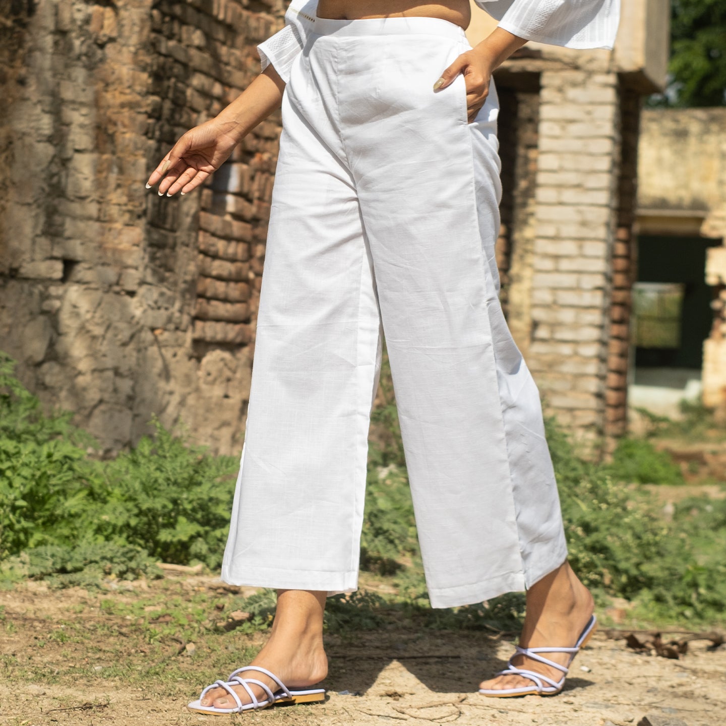 White A-line flared front pleat detail kurta paired with palazzo pants