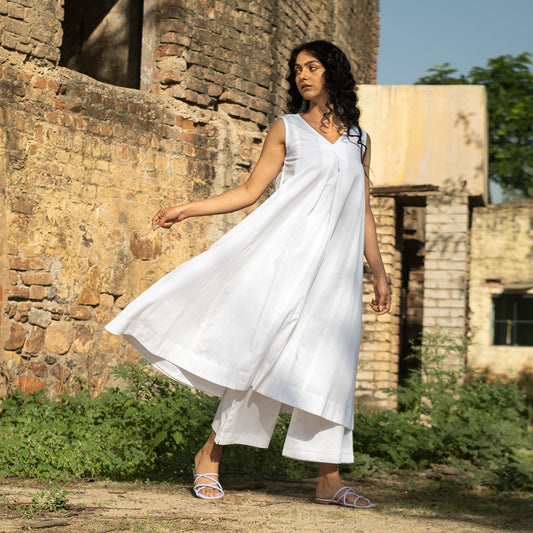 White A-line flared front pleat detail kurta paired with palazzo pants