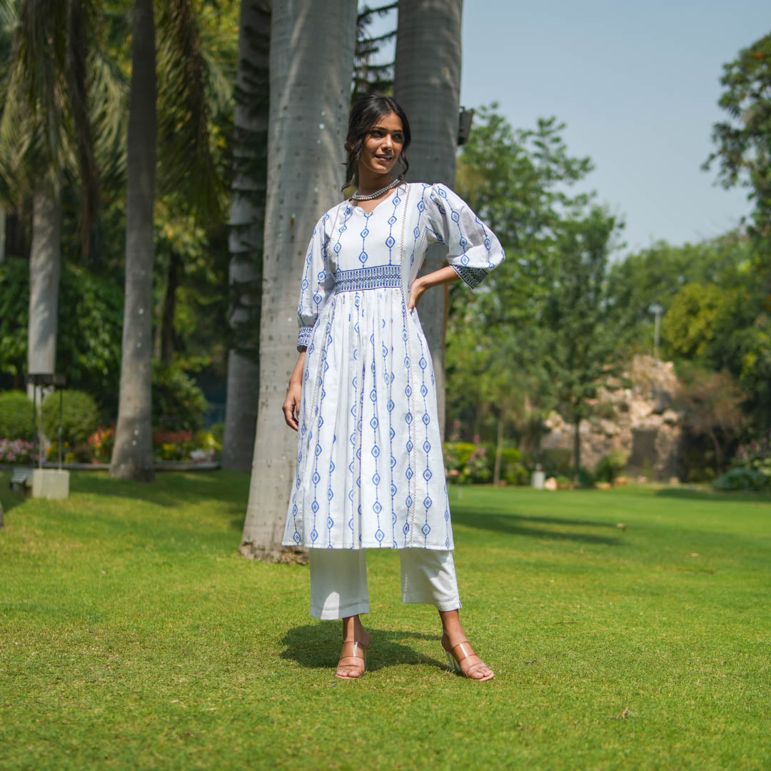 White Hand Block Printed Fit and Flare Kurta Set with Embroidered Waist Detail and Back Tie-up( set of 2 )