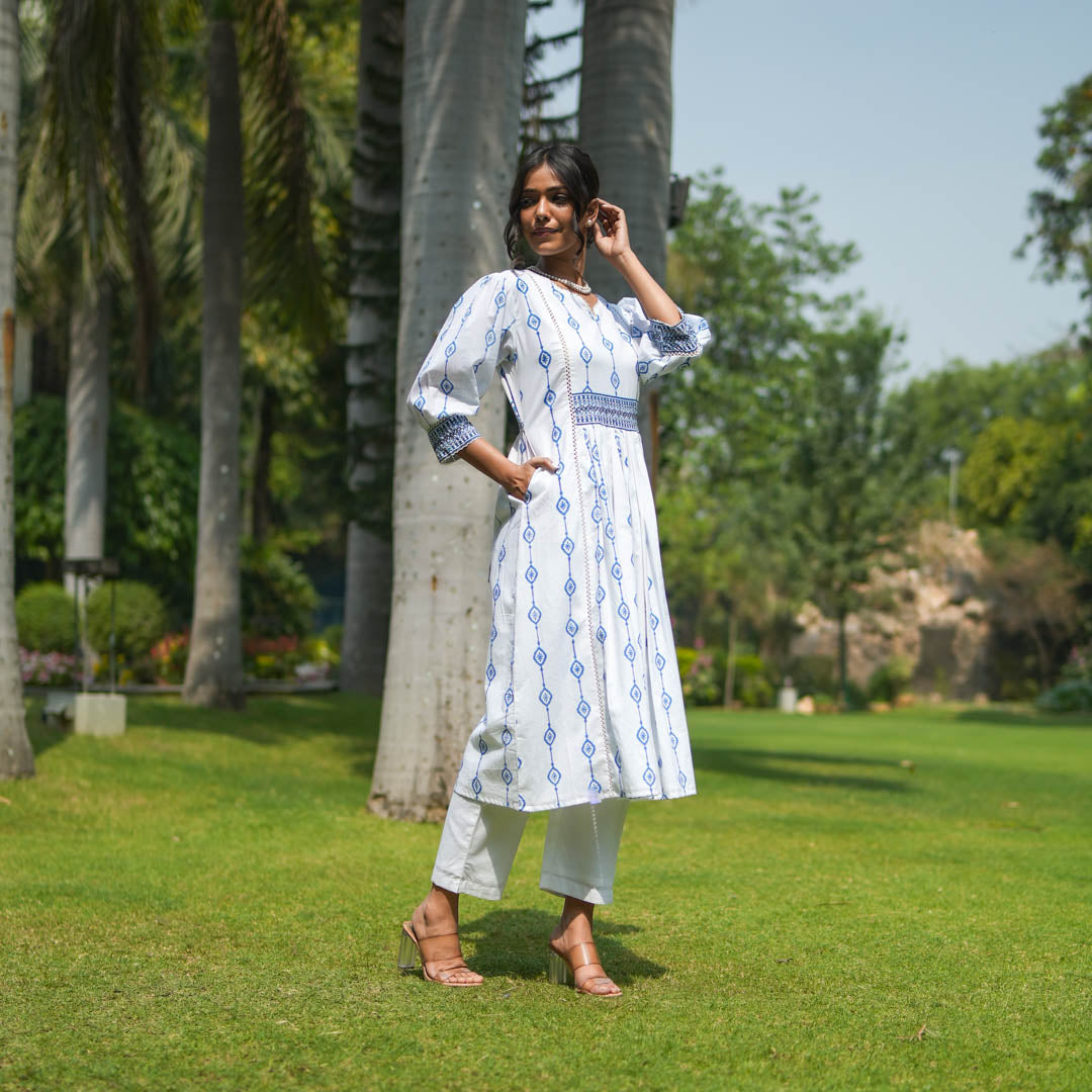 White Hand Block Printed Fit and Flare Kurta Set with Embroidered Waist Detail and Back Tie-up( set of 2 )