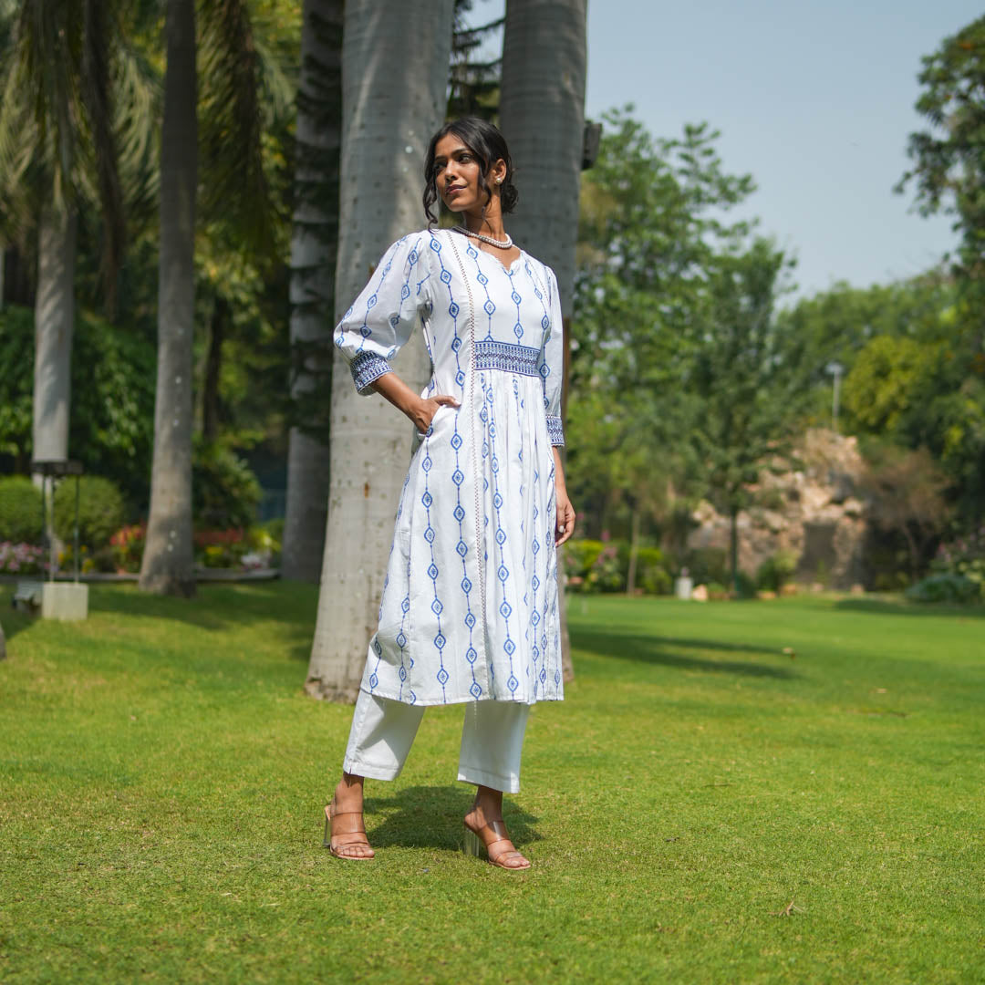 White block printed fit and flare kurta with yoke and tie-up