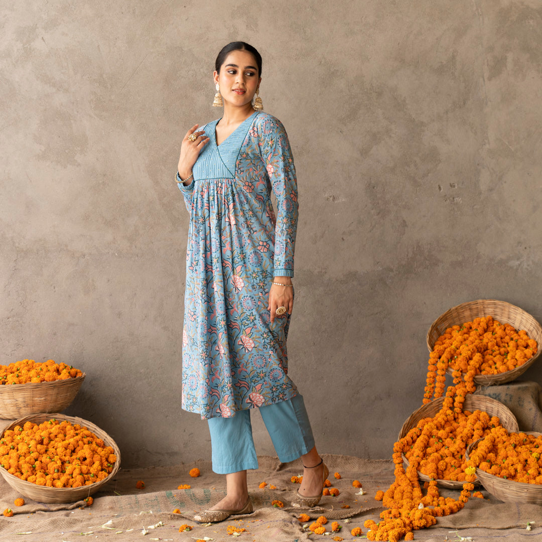 Blue block printed with yoke and sleeve detailed A line suit set with dupatta