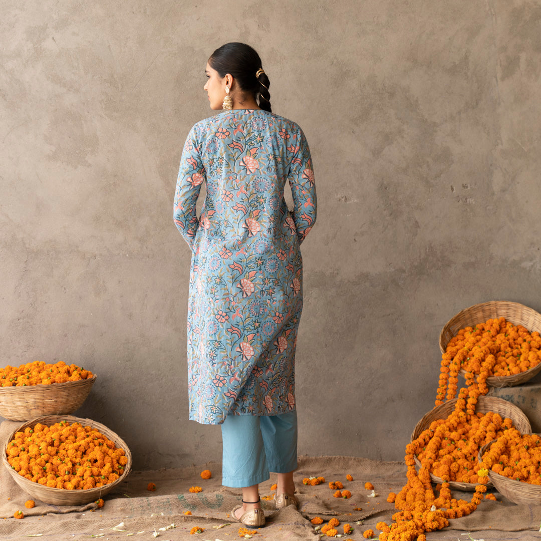 Blue block printed with yoke and sleeve detailed A line kurta paired with blue solid straight pants set
