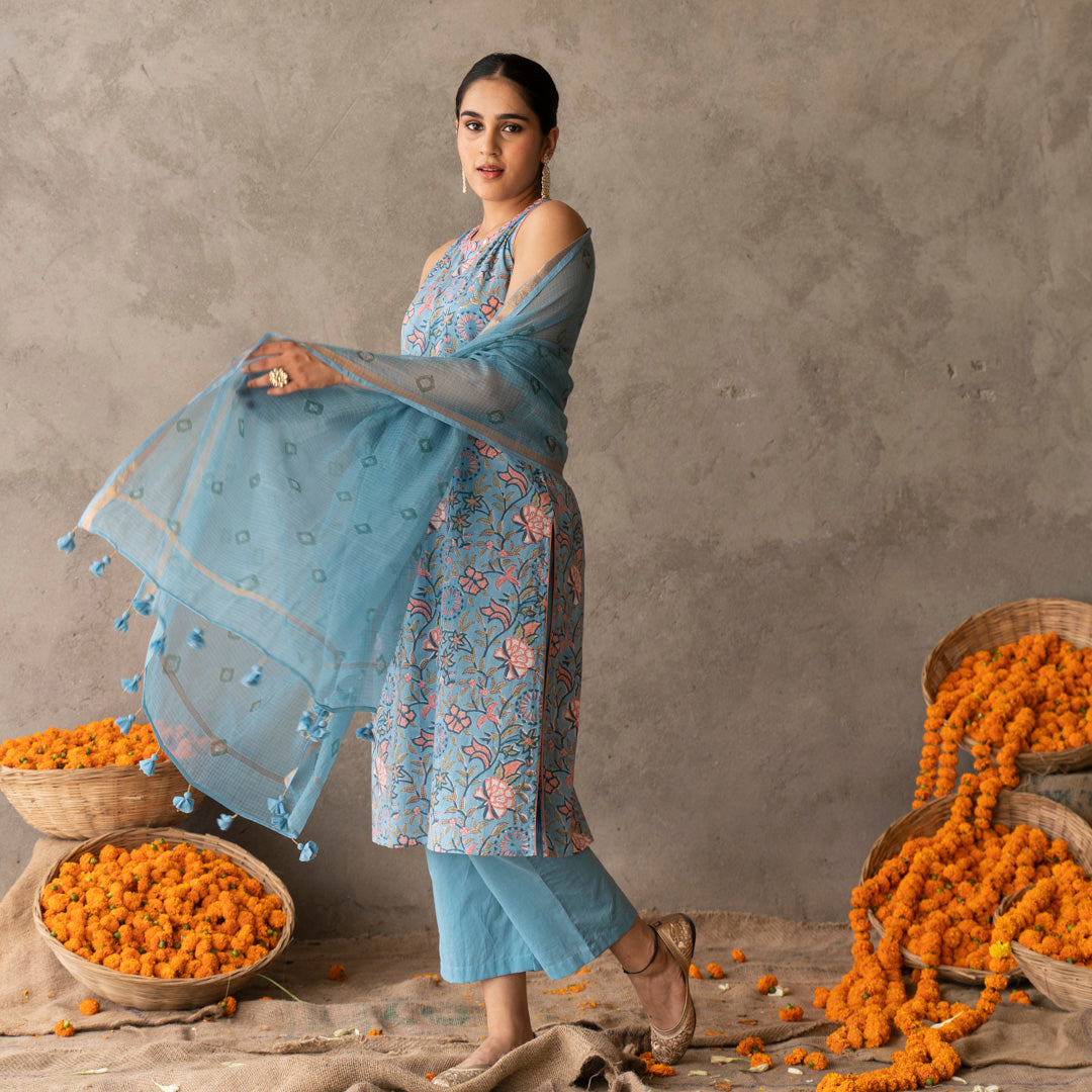 Blue block printed and embroidery detailed straight fit sleevless suit set with dupatta