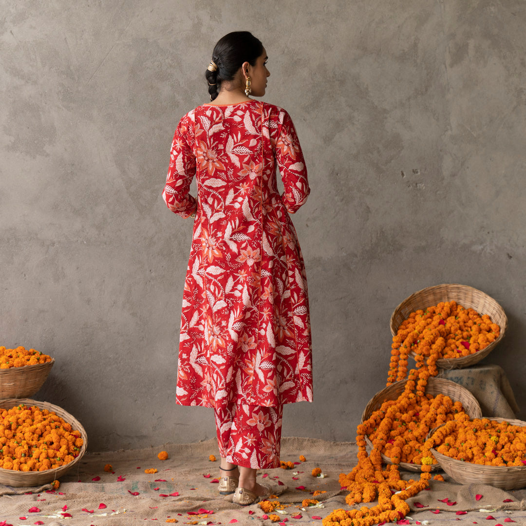Red block printed panelled anarkali kurta with contrast piping detail paired with red block printed straight pants set