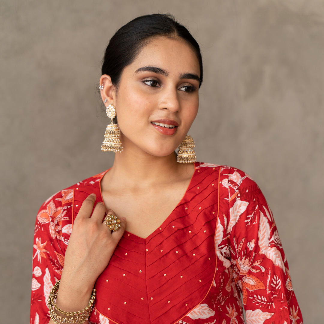 Red block printed pin tuck detail straight fit kurta with solid red straight pants set