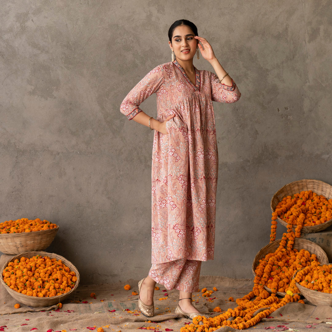 Peach block printed embroidered detail A line kurta with solid peach pants set