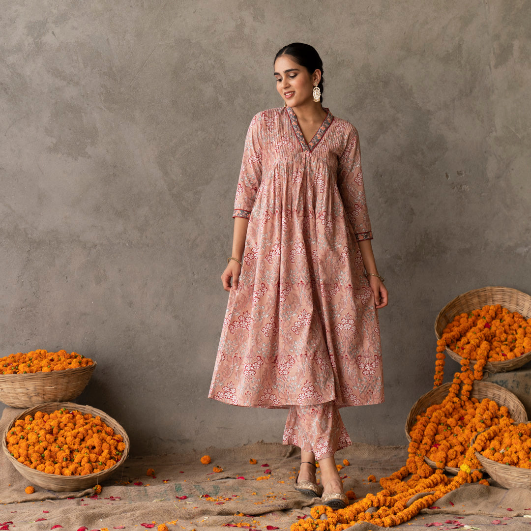 Peach block printed embroidered detail A line suit set with dupatta