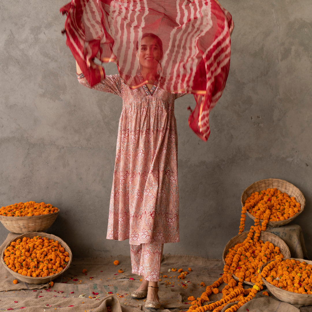 Peach block printed embroidered detail A line suit set with dupatta