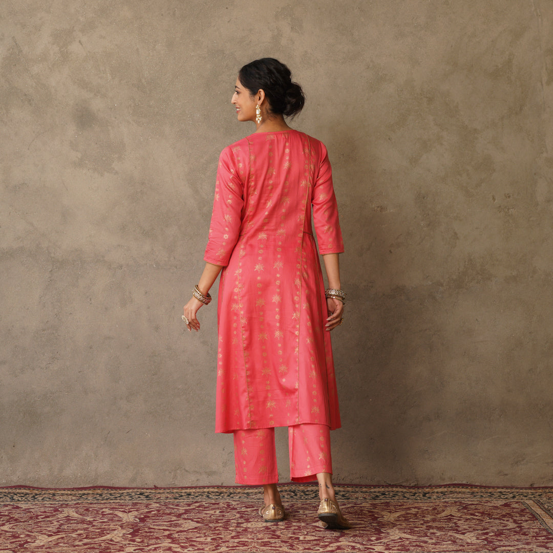 Coral block printed Anarkali kurta with hand embroidery and piping details