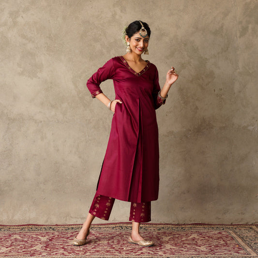 Front Pleat Solid Plum Kurta with Hand Embroidery and Gold Printed Details with Printed Pants (Set of 2)