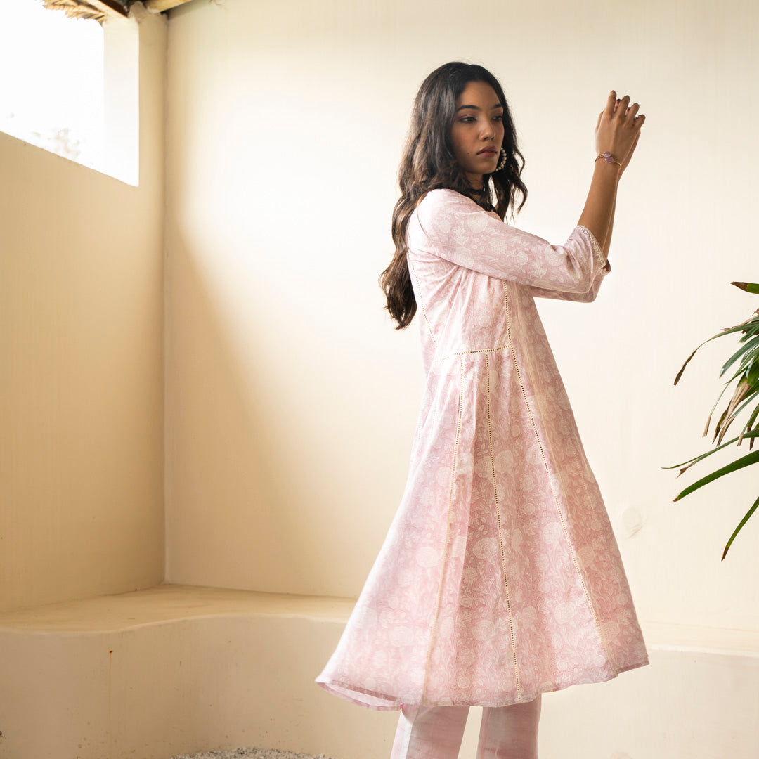 Blush pink block printed Anarkali kurta with embroidery detail neckline paired with shibori tie dye trousers set