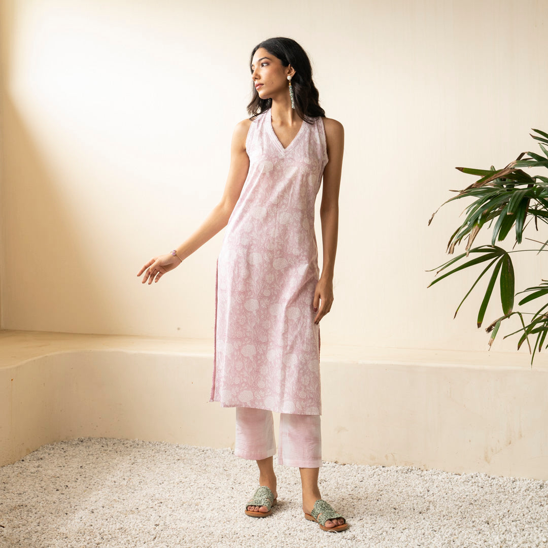 Blush Pink hand block printed sleevless kurti with side slits paired with shibori tie dye trousers set