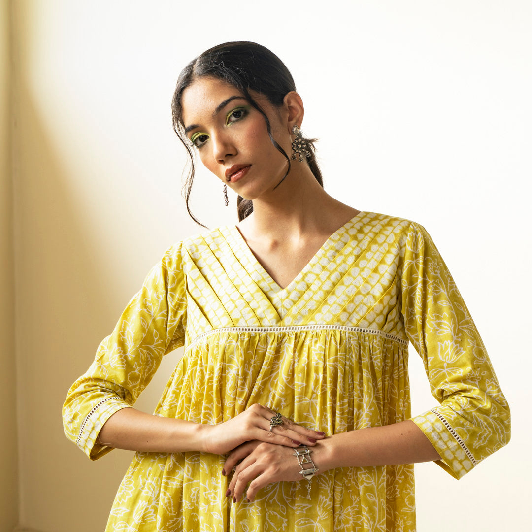 Chartreuse green block printed Anarkali kurta with V Neck with pleat detail neckline with Shibori tie dye trousers