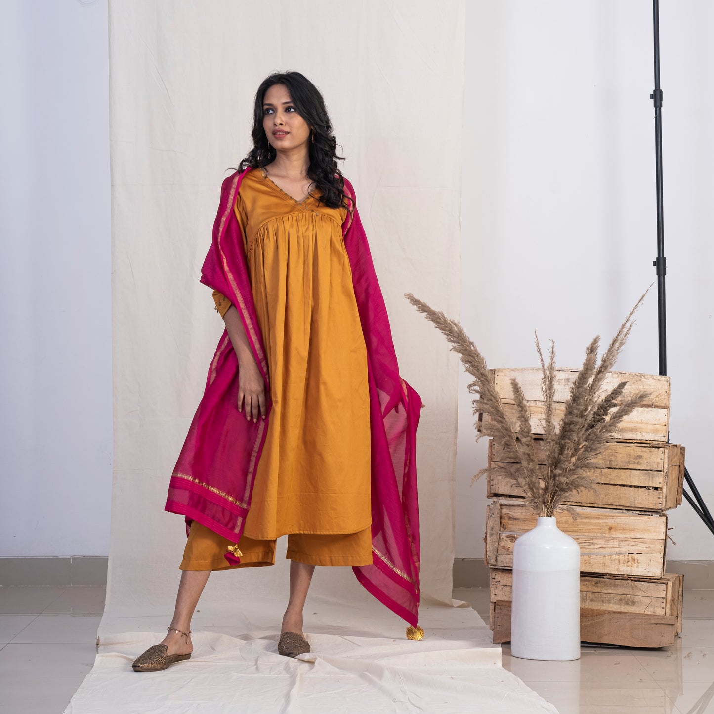 Gold V neck Full Pleated kurta Set With Plazzo and Pink Dupatta