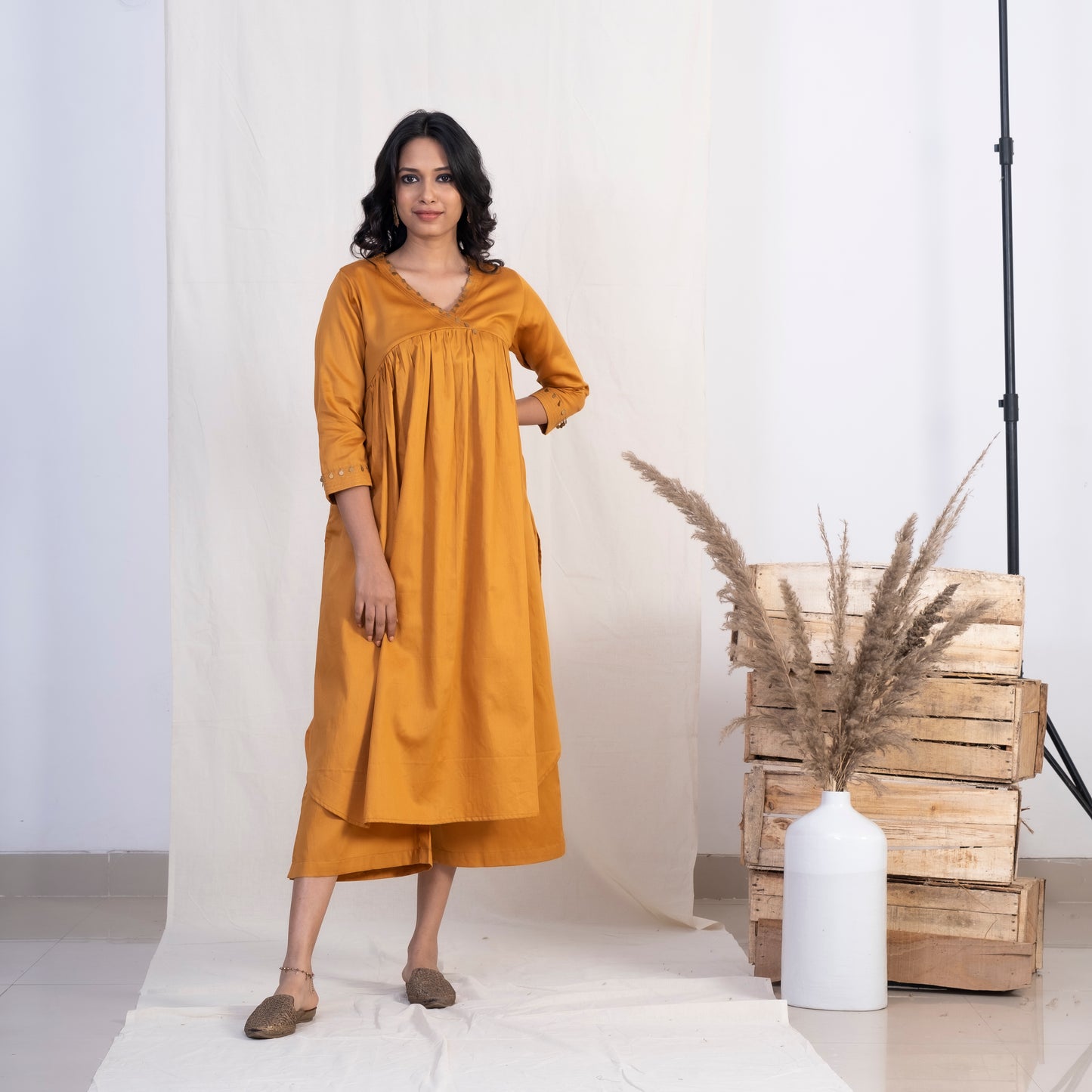 Gold V neck Full Pleated kurta Set With Plazzo and Pink Dupatta