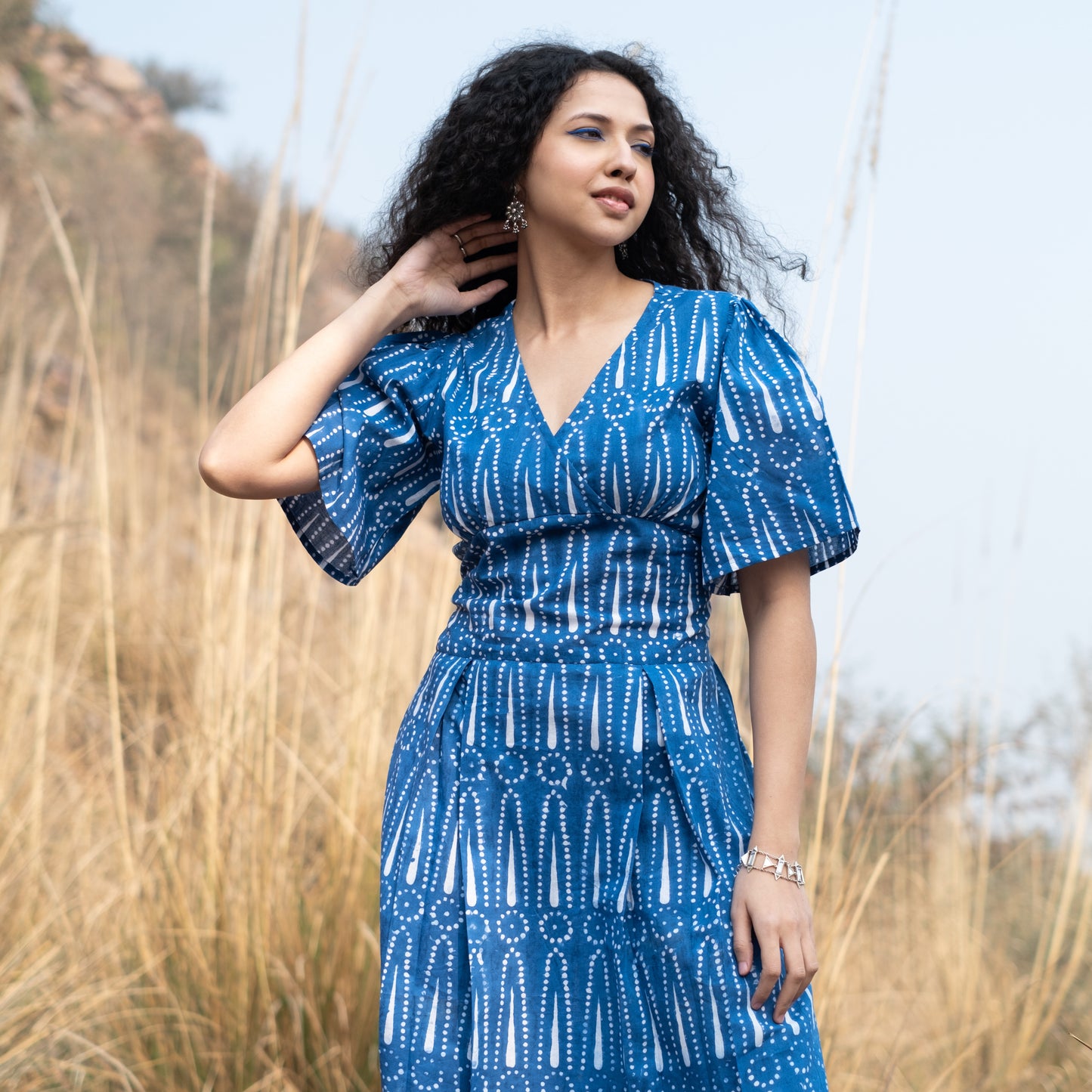 Indigo block printed box pleat dress V neck and relaxed sleeves with side pockets