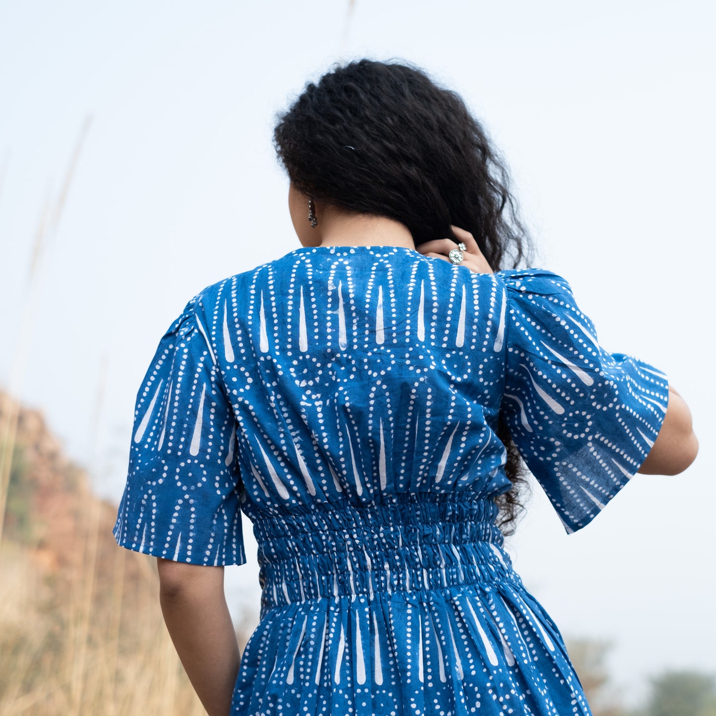 Indigo block printed box pleat dress V neck and relaxed sleeves with side pockets